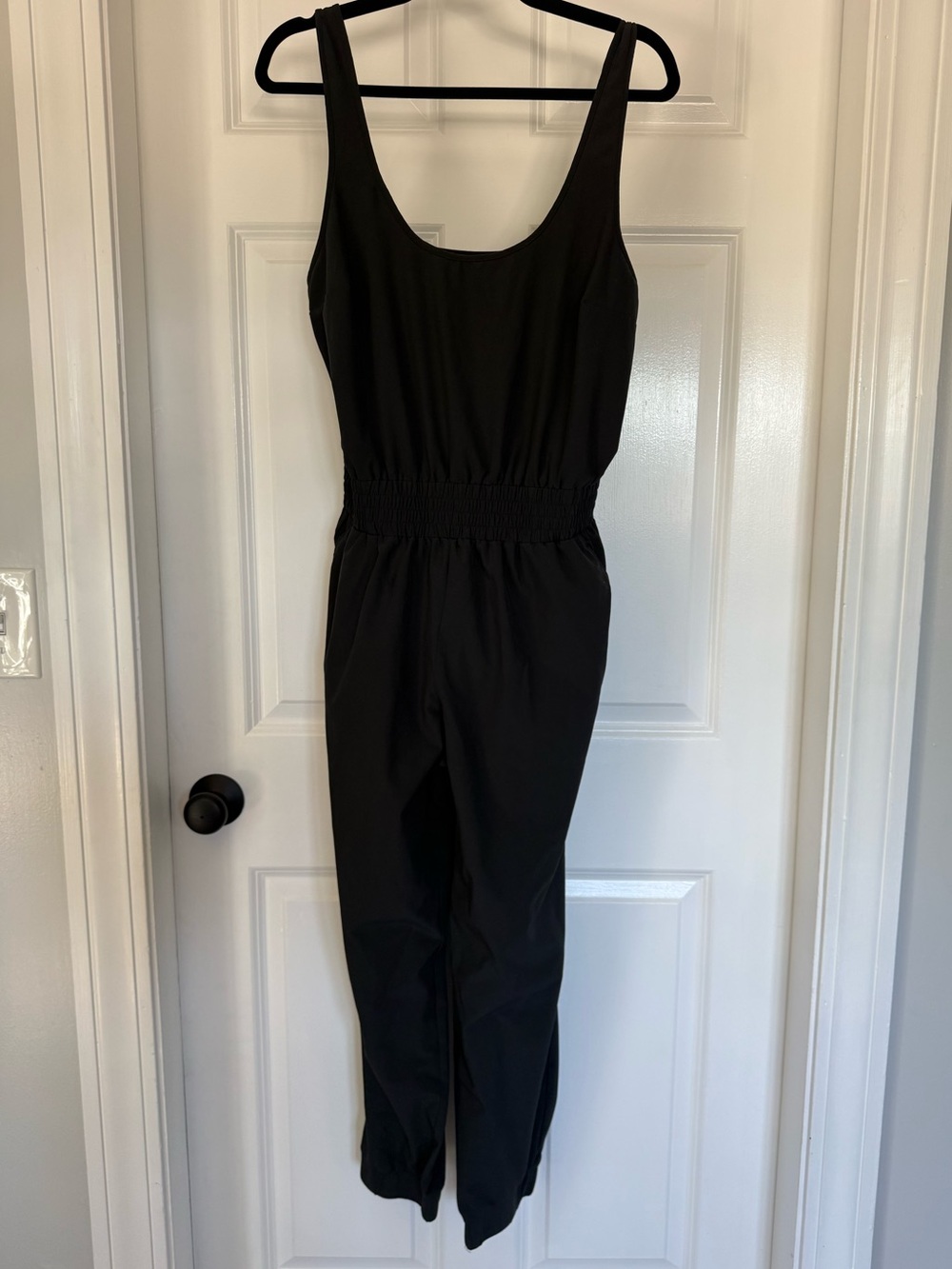 Abercrombie & Fitch Black Traveler Sleeveless Smocked-Waist Jumpsuit - Picture 2 of 12